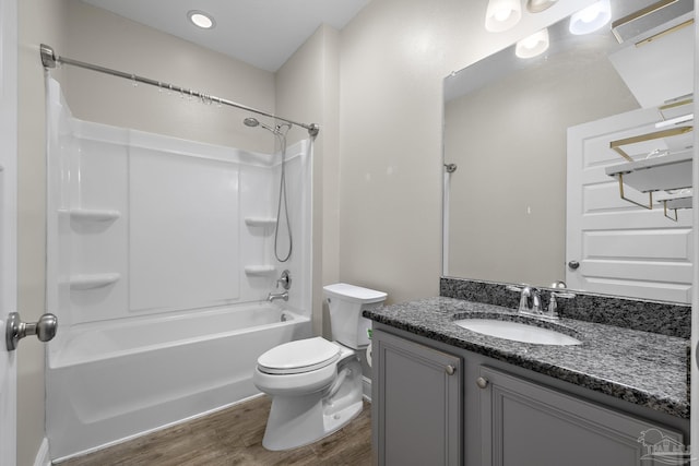 3526 Whitetail Ln, Pensacola, FL 32526 - full bathroom featuring wood finished floors, toilet, vanity, and washtub / shower combination