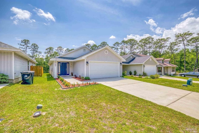 ranch-style house with an attached garage, driveway, a front yard, and fence