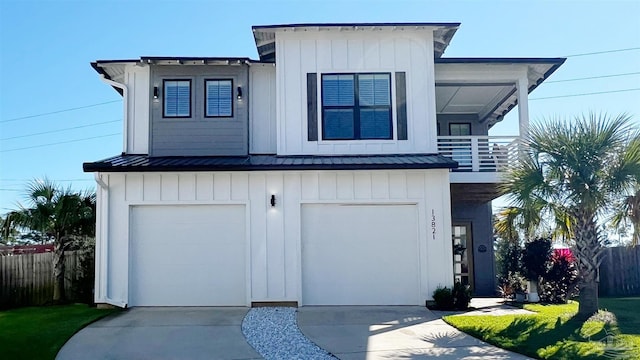 view of front of house with a garage and a balcony