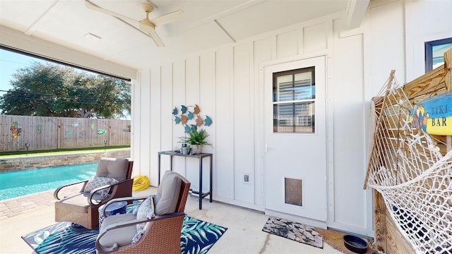 exterior space with a fenced in pool and a patio