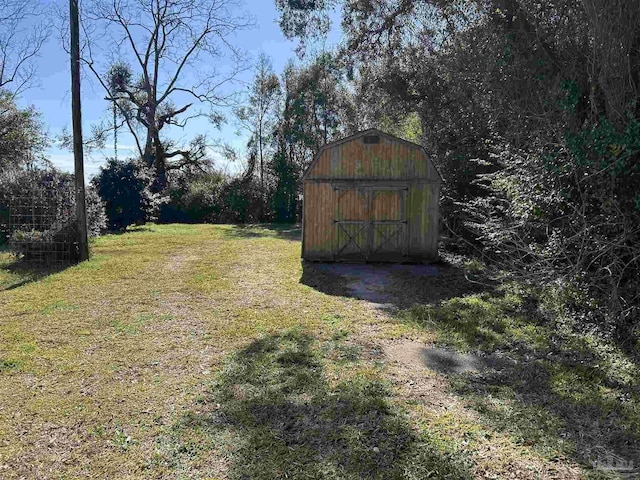 view of road featuring driveway and a gated entry