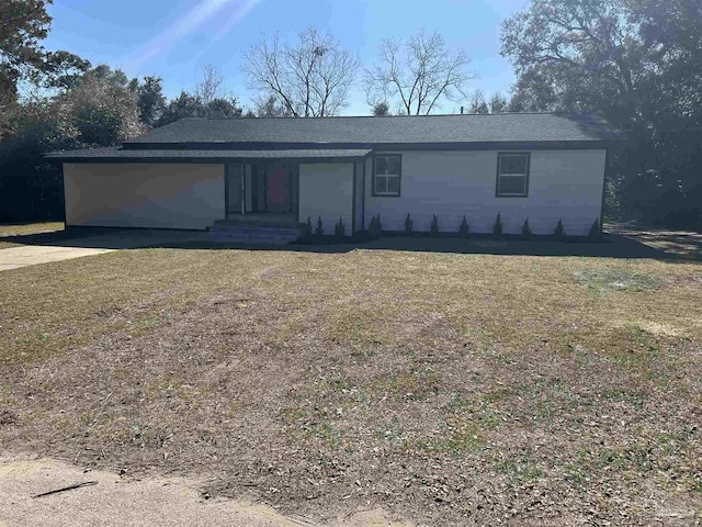 ranch-style home with concrete driveway