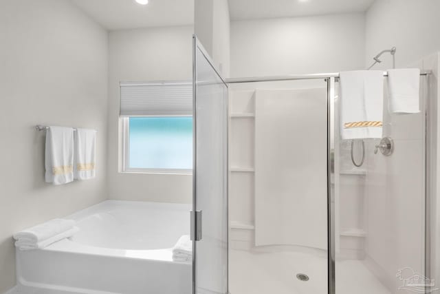 full bathroom with a stall shower, recessed lighting, and a bath
