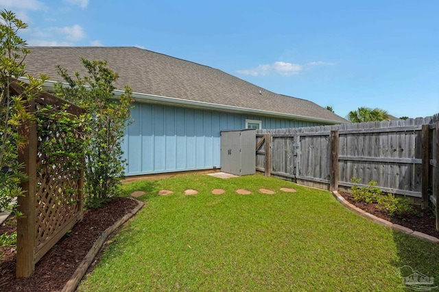 view of yard with a fenced backyard