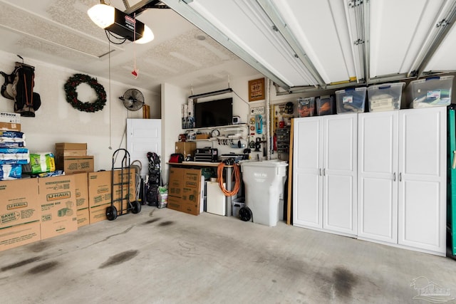 garage featuring a garage door opener