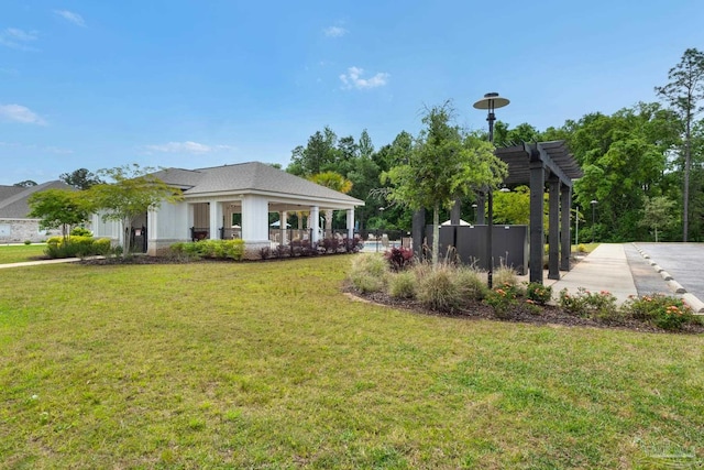 view of yard with a pergola and a gazebo
