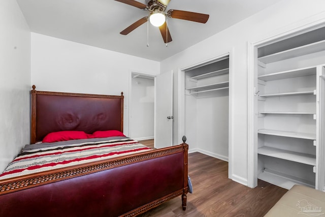 bedroom with ceiling fan, a closet, and dark wood-type flooring