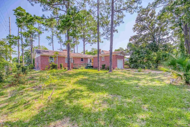 view of yard featuring a garage