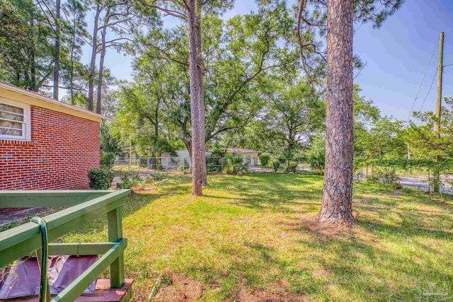 view of yard with fence