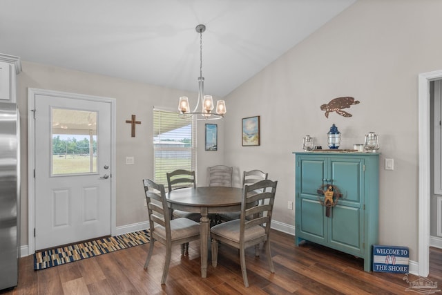 dining space with baseboards, dark wood-style flooring, a chandelier, and vaulted ceiling