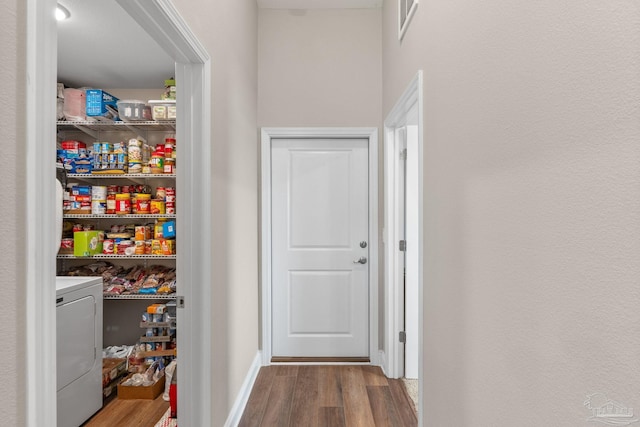 pantry with visible vents and washer / clothes dryer