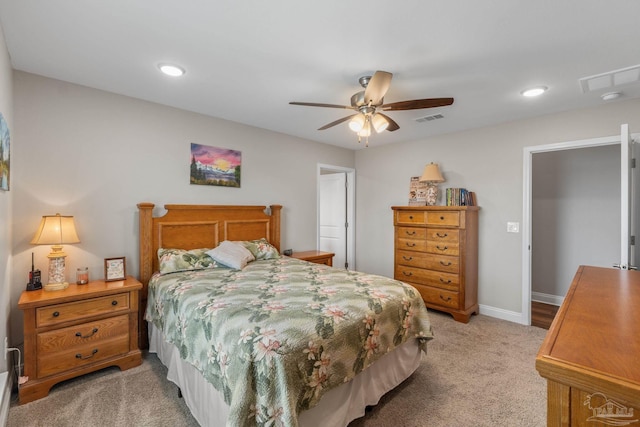 bedroom with recessed lighting, ceiling fan, visible vents, and light carpet