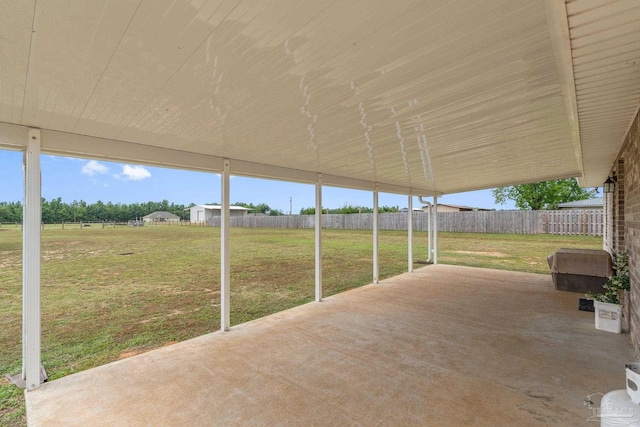 view of patio / terrace featuring fence