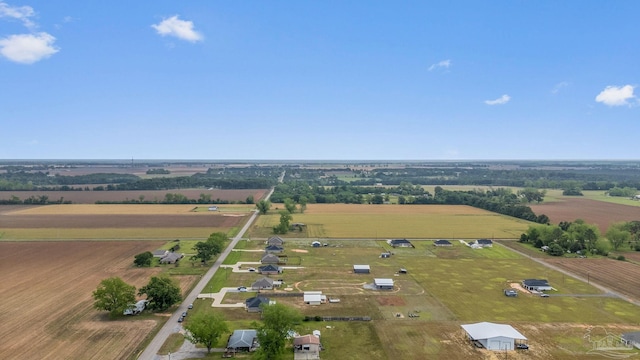 birds eye view of property featuring a rural view