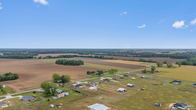 birds eye view of property featuring a rural view