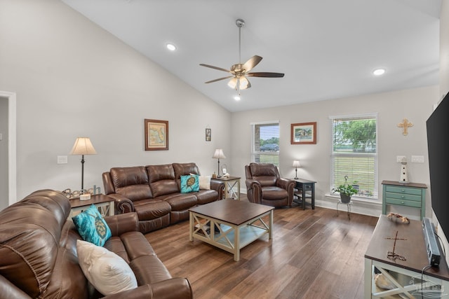 living room with a ceiling fan, wood finished floors, baseboards, high vaulted ceiling, and recessed lighting