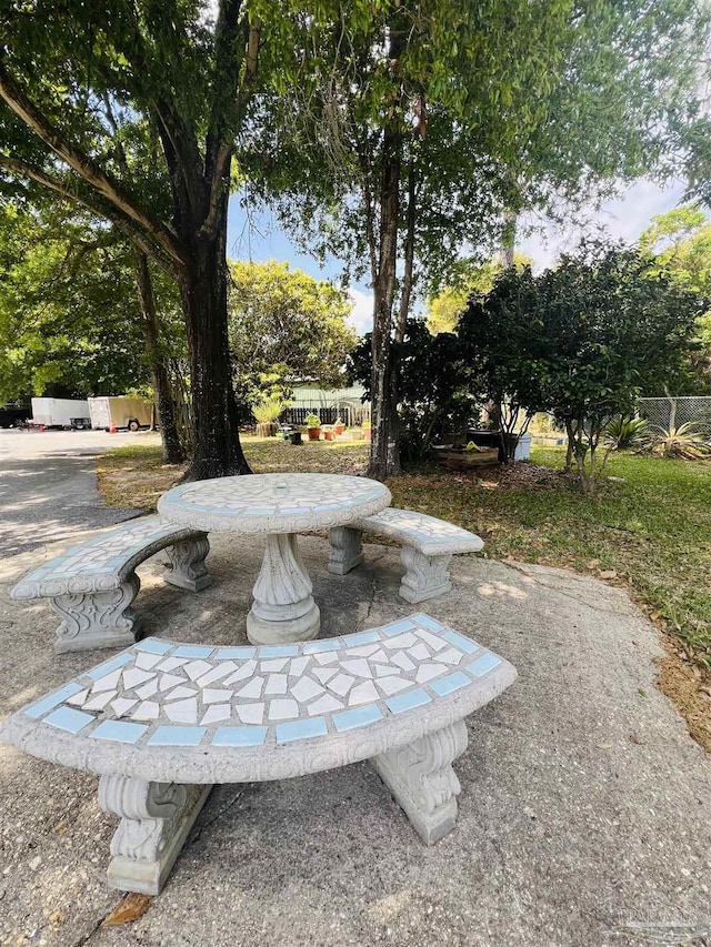 1100 Shoreline Dr Unit 207, Gulf Breeze, FL 32561 - view of yard with a patio and outdoor dining space