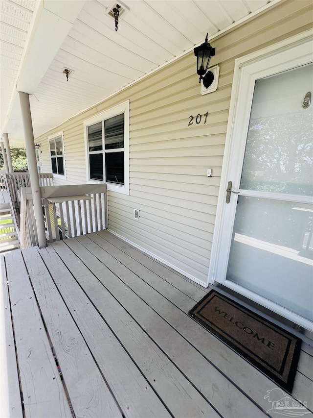 1100 Shoreline Dr Unit 207, Gulf Breeze, FL 32561 - view of wooden porch