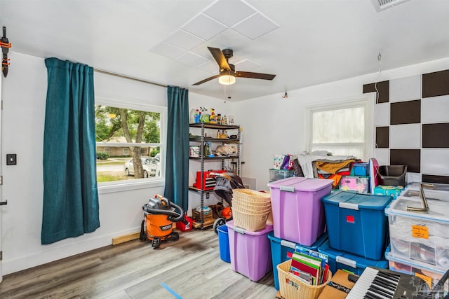 game room featuring ceiling fan and light hardwood / wood-style floors