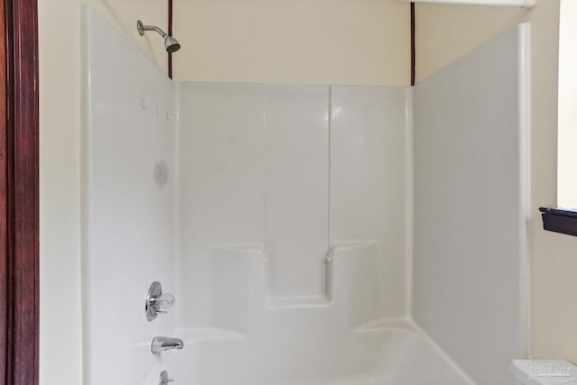 full bath featuring  shower combination