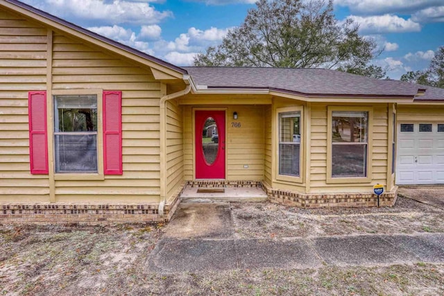 view of front of home with a garage