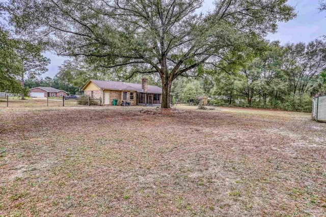 view of yard featuring fence