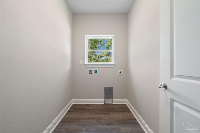 washroom featuring hookup for an electric dryer, hookup for a washing machine, and dark hardwood / wood-style flooring