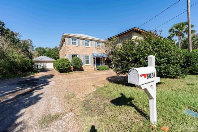 view of front of property with a front yard