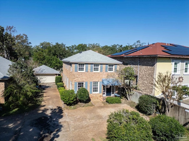 view of front of home with solar panels