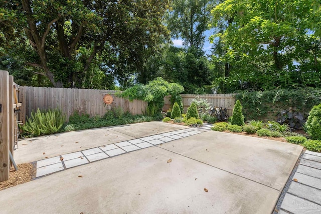 1132 N I St, Pensacola, FL 32501 - fenced backyard with a patio area