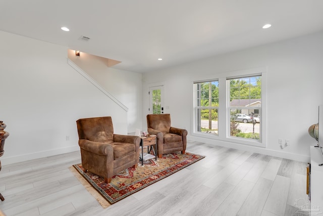 1132 N I St, Pensacola, FL 32501 - living area with light wood finished floors and recessed lighting