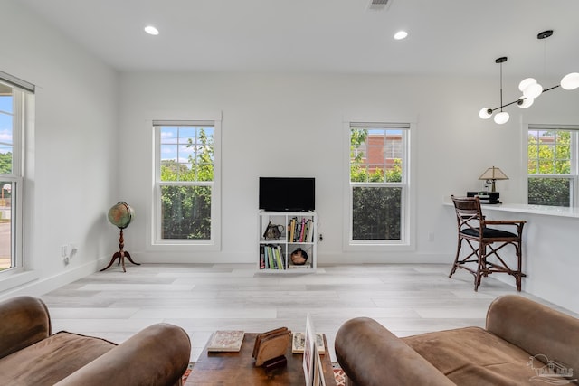 1132 N I St, Pensacola, FL 32501 - living area featuring wood finished floors and recessed lighting