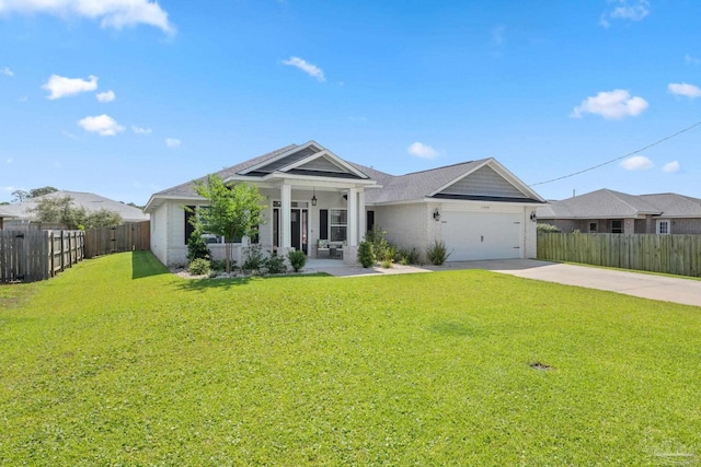 ranch-style house featuring fence, an attached garage, concrete driveway, and a front yard