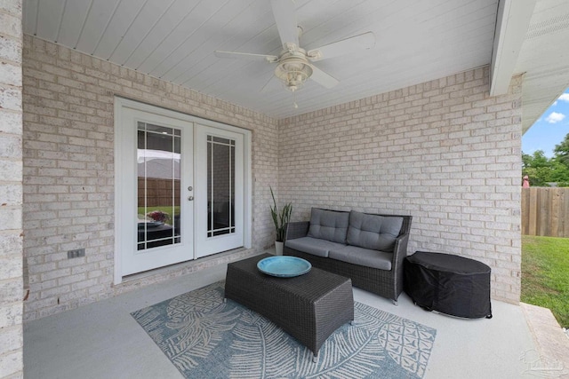 view of patio featuring french doors, fence, ceiling fan, and outdoor lounge area