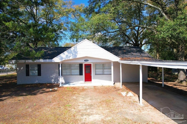 view of front of house featuring a carport