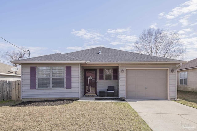 ranch-style home featuring a garage and a front yard