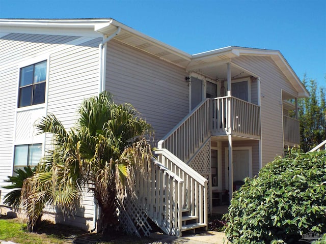 view of home's exterior featuring a balcony