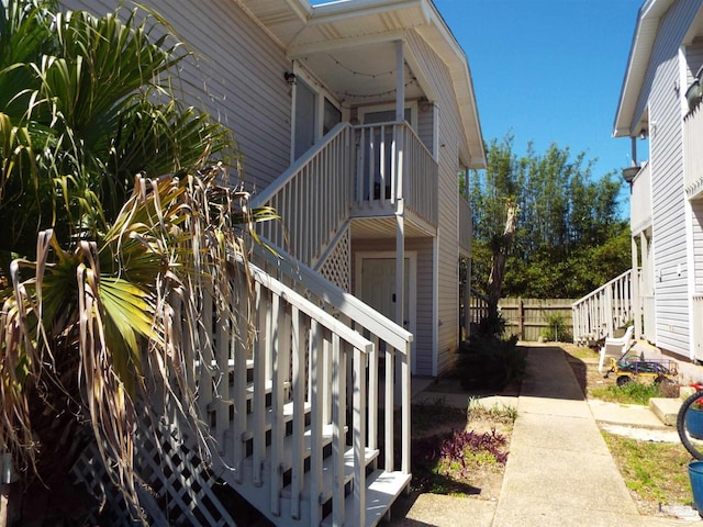 view of home's exterior with a balcony