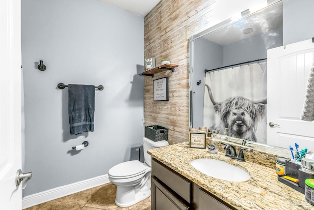 2704 Wildhurst Trl, Pace, FL 32571 - bathroom featuring vanity, wood walls, and tile patterned flooring