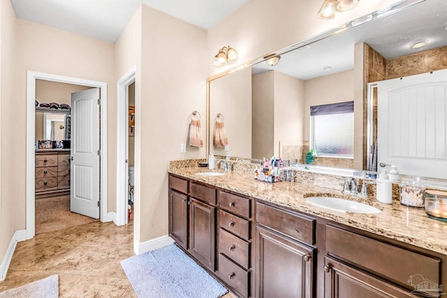2704 Wildhurst Trl, Pace, FL 32571 - bathroom featuring double vanity and a bathtub