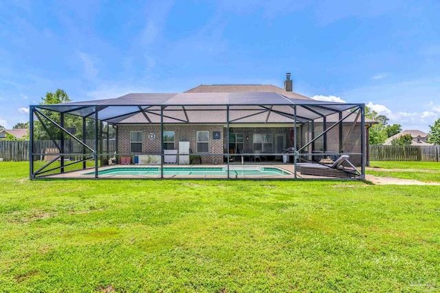 2704 Wildhurst Trl, Pace, FL 32571 - rear view of property with a fenced backyard, a chimney, brick siding, and a lanai
