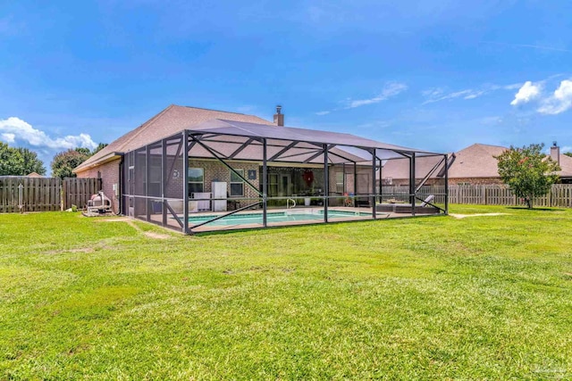 2704 Wildhurst Trl, Pace, FL 32571 - back of property featuring a fenced backyard and a chimney