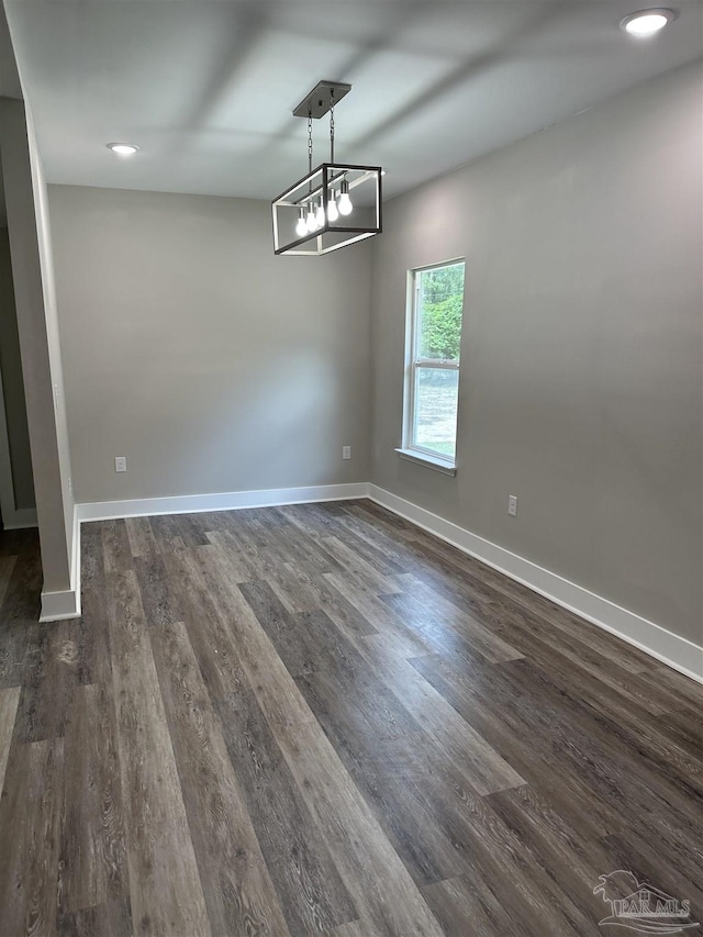 5661 Dupree Rd, Milton, FL 32570 - empty room featuring dark wood-style flooring and recessed lighting