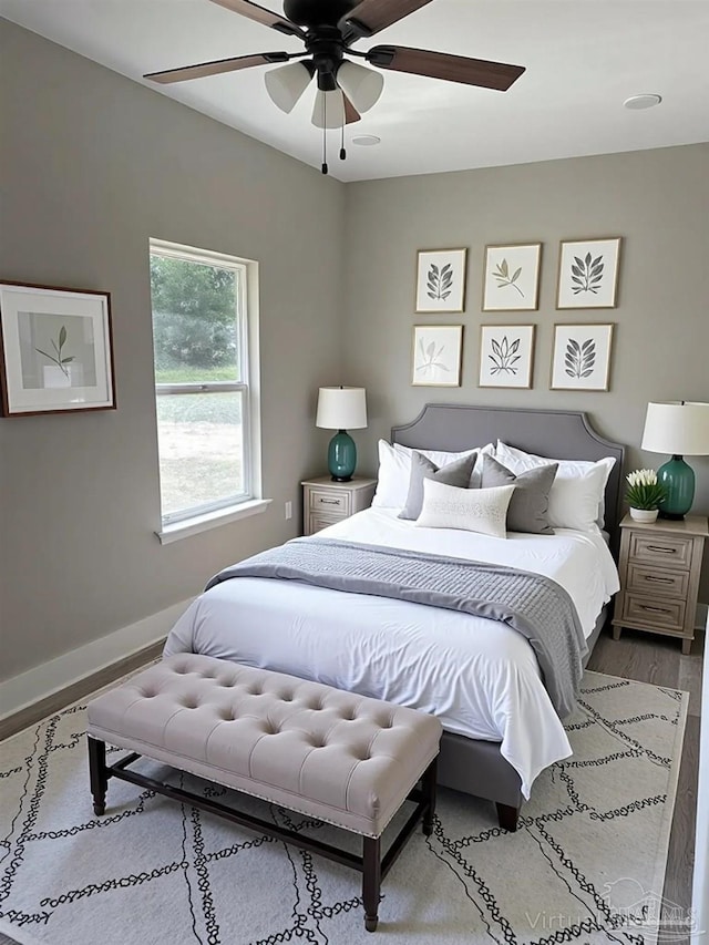 5661 Dupree Rd, Milton, FL 32570 - bedroom featuring wood finished floors and a ceiling fan