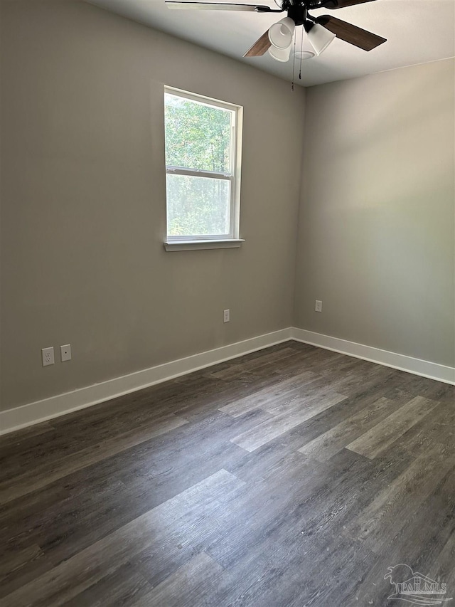 5661 Dupree Rd, Milton, FL 32570 - empty room with ceiling fan and dark wood finished floors