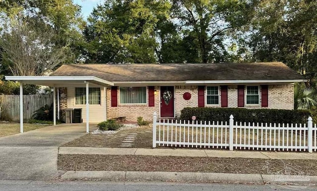 ranch-style house with a carport