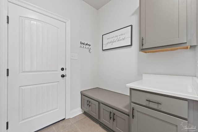mudroom with light tile patterned floors