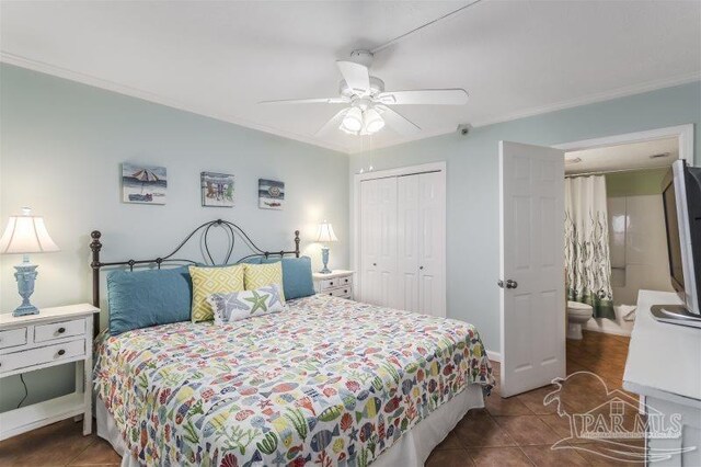 14623 Perdido Key Dr Unit W502, Pensacola, FL 32507 - bedroom featuring ornamental molding, a closet, tile patterned floors, and a ceiling fan