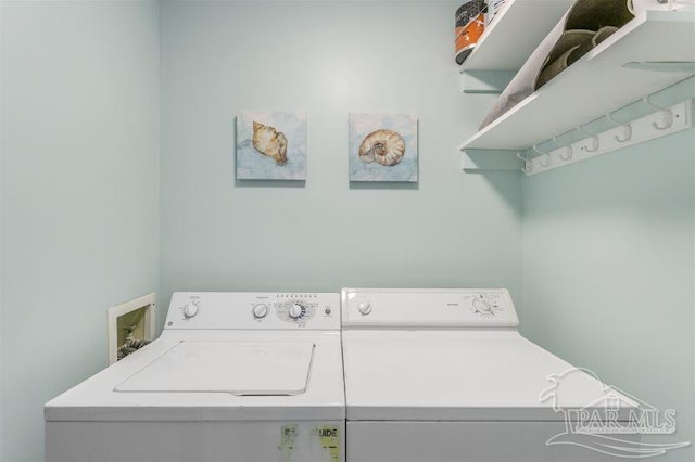 14623 Perdido Key Dr Unit W502, Pensacola, FL 32507 - washroom featuring laundry area and washer and clothes dryer