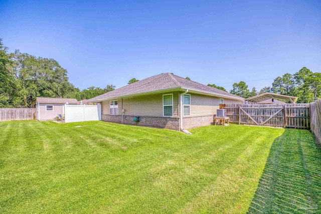 exterior space with a yard and a storage shed